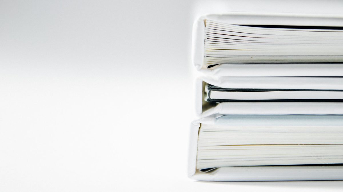 A stack of documents, in an illustrative photo used on Headwaters Wire