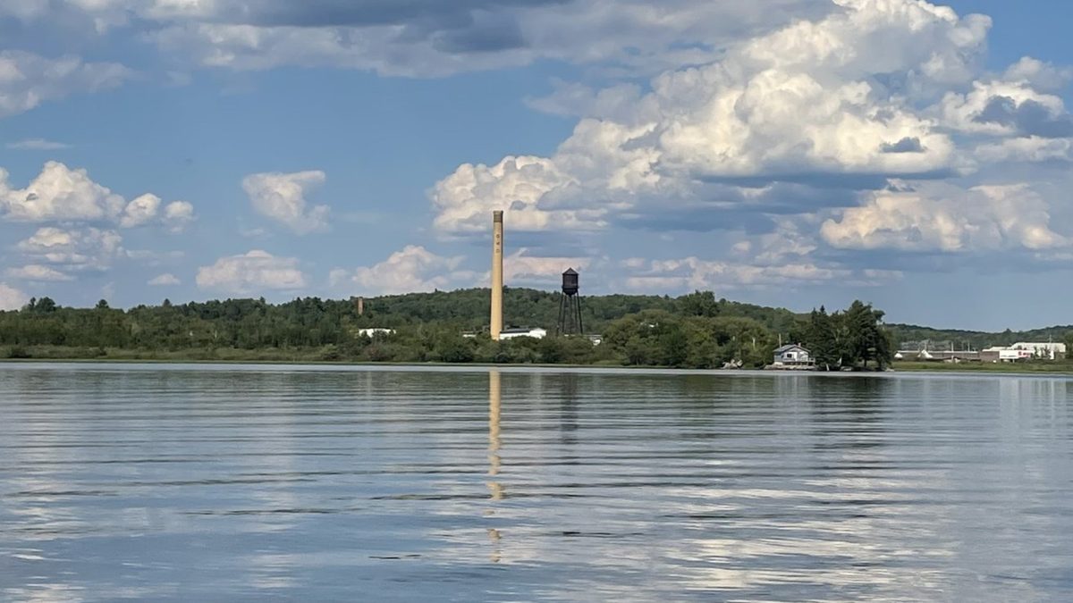 Illustrative image of industrial smokestacks for a Headwaters Wire story